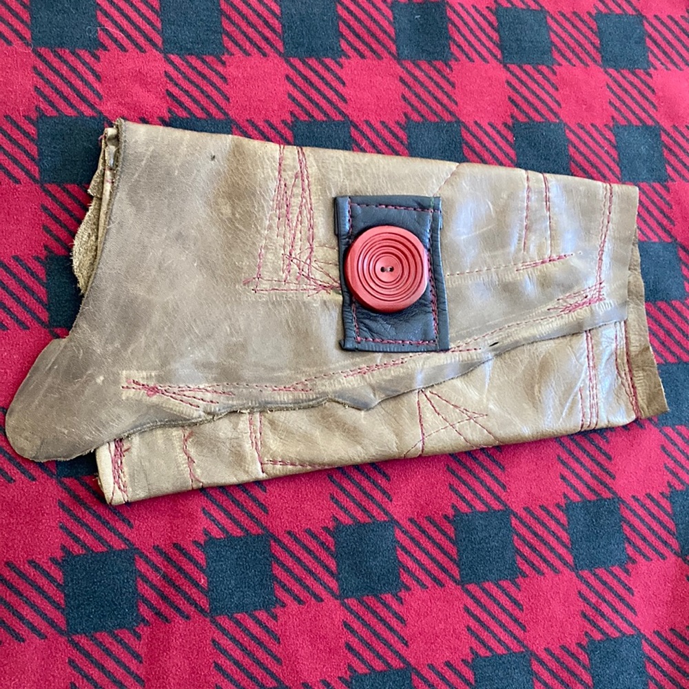 One of a kind, awesome, leather clutch